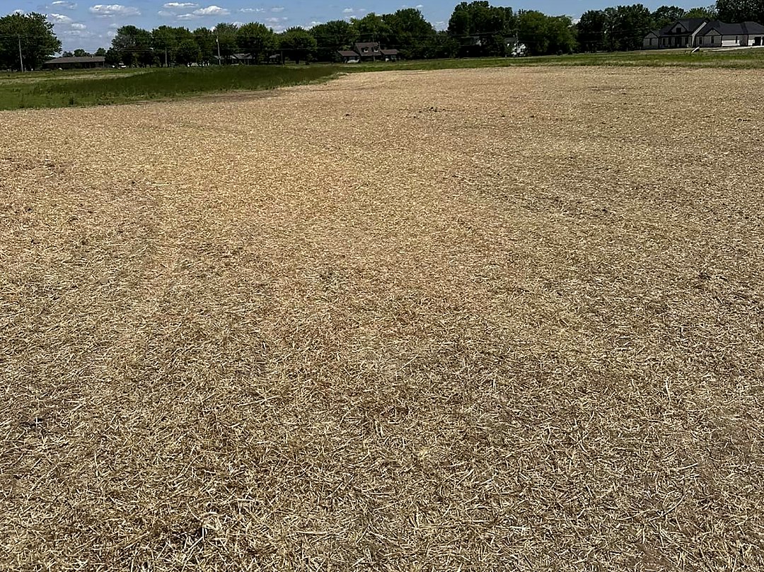 Wide stripped and levelled field ready for building layout